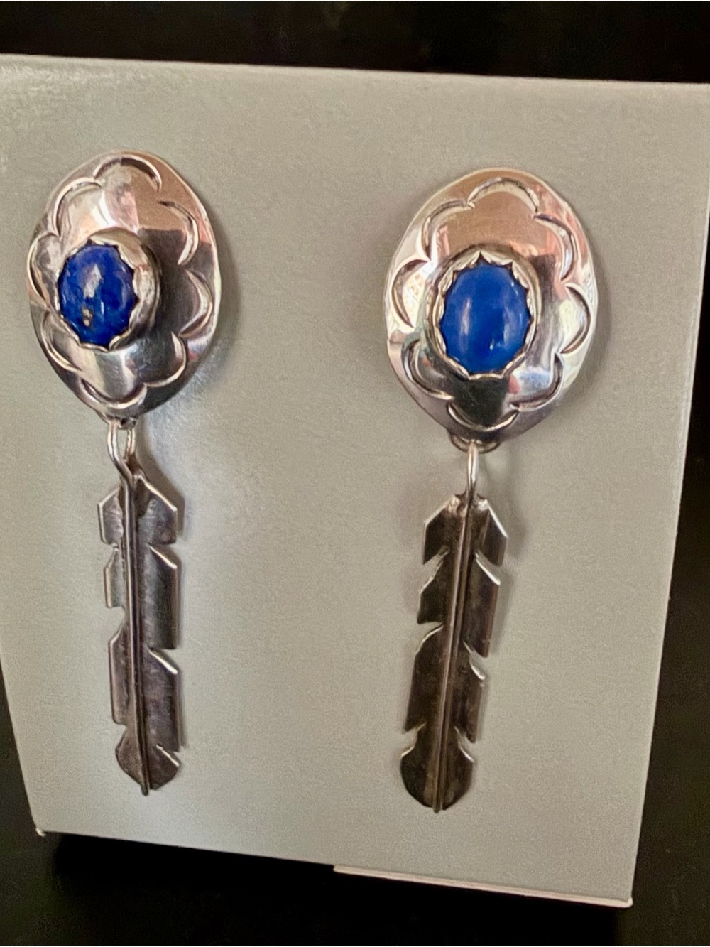 Sterling Silver Feather Drop Earrings with Blue Stone